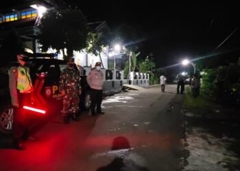 Polisi dan TNI Lakukan Pengamanan Pemakaman Jenazah Covid-19