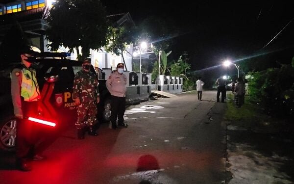 Polisi dan TNI Lakukan Pengamanan Pemakaman Jenazah Covid-19