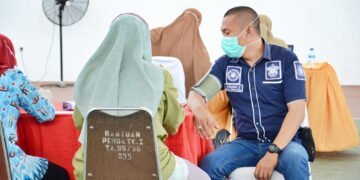 Satpam Universitas Hasanuddin Ikut Vaksinasi Dosis Pertama