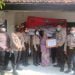 HUT Satpam Ke-41, Polisi dan Satpam Bagikan Sembako ke Masyarakat Kurang Mampu