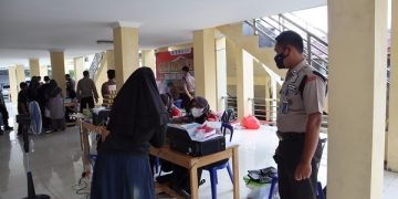 Satpam dan Polres Kapuas Amankan Jalannya Vaksinasi Anak