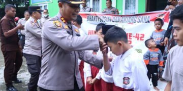 Rangkaian HUT ke-42 Satpam, Polres Rohul Berbagi ke Panti Asuhan