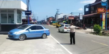 Antisipasi Kemacetan, Satpam Bank BRI Sigap Atur Lalin