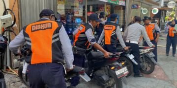 FKDM Usul Pemprov DKI Ajak Minimarket Rekrut Jukir Liar Jadi Satpam